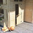 Wooden playhouse with stable door
