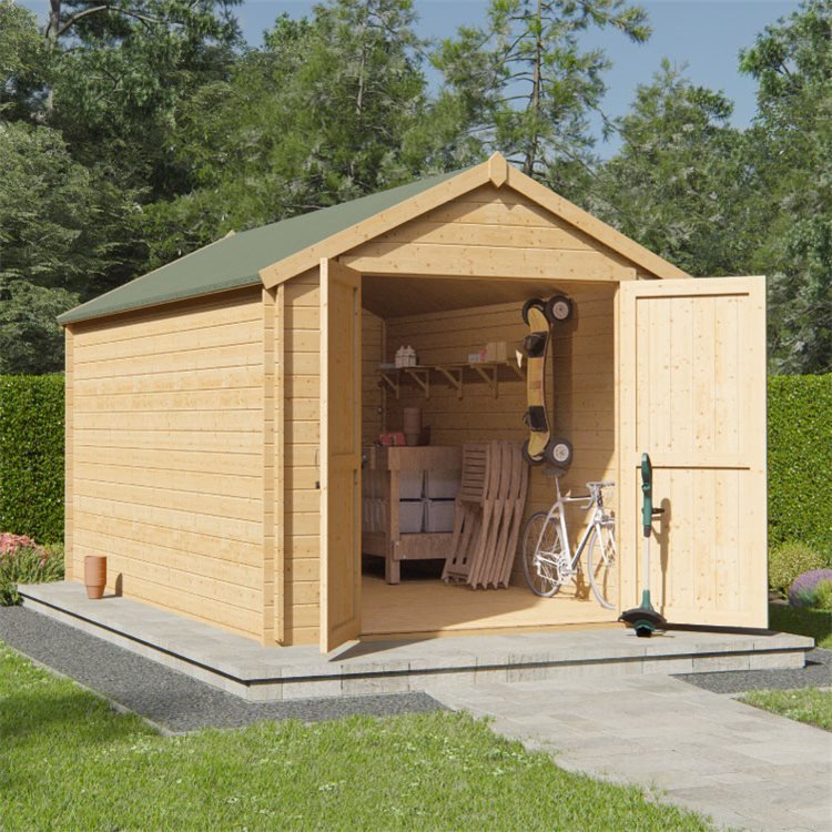 The BillyOh Pro Apex Cabin Shed in a grassy garden