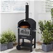 Pizza Oven, BBQ and Smoker with Pizza Oven door open in a small walled garden surrounded by plants.
