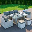 Minerva 7 Seater Rattan Sofa and Dining set with cutlery and crockery in a patio garden.