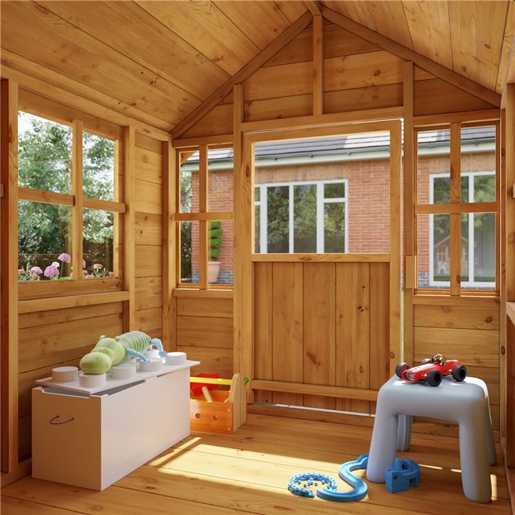 Small wooden playhouse interior with toys