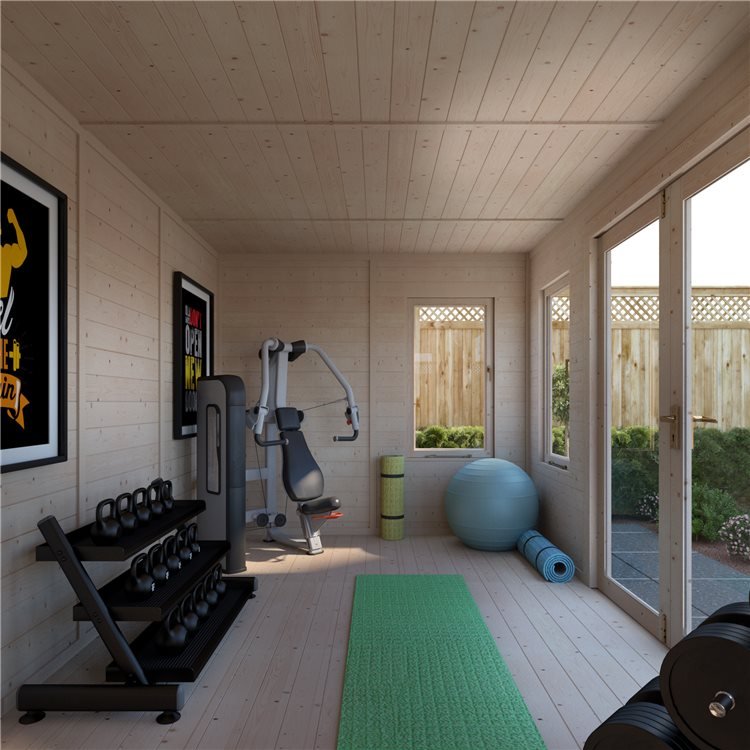 An indoor home gym in a large shed